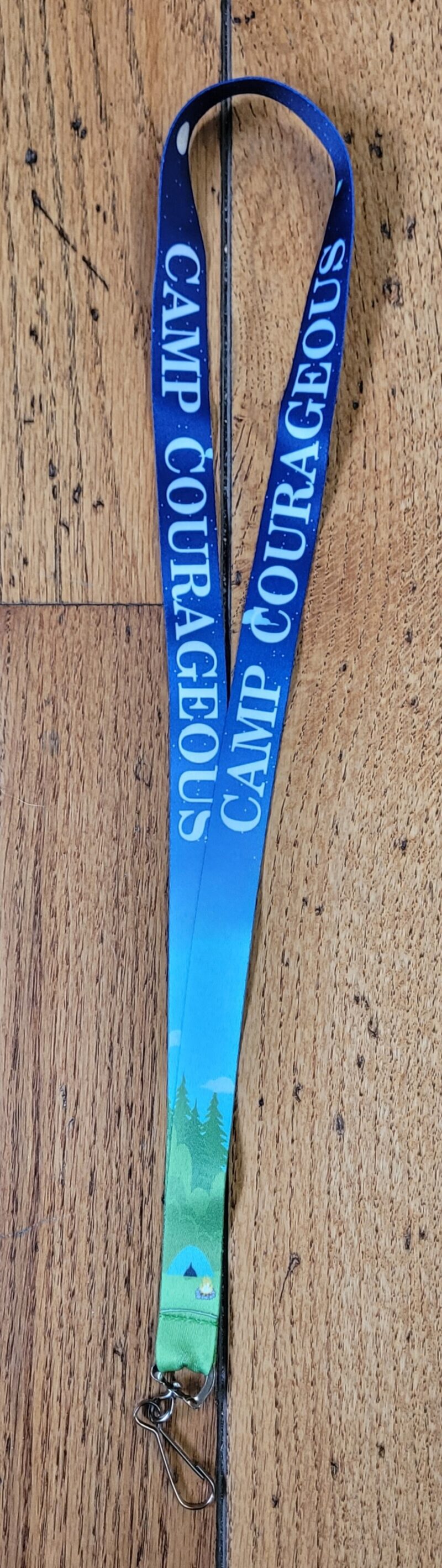 blue lanyard with camping scene